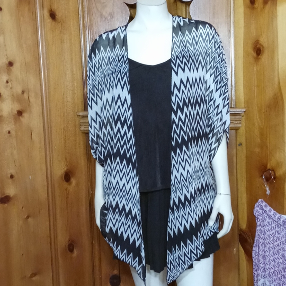 Dots Shrug